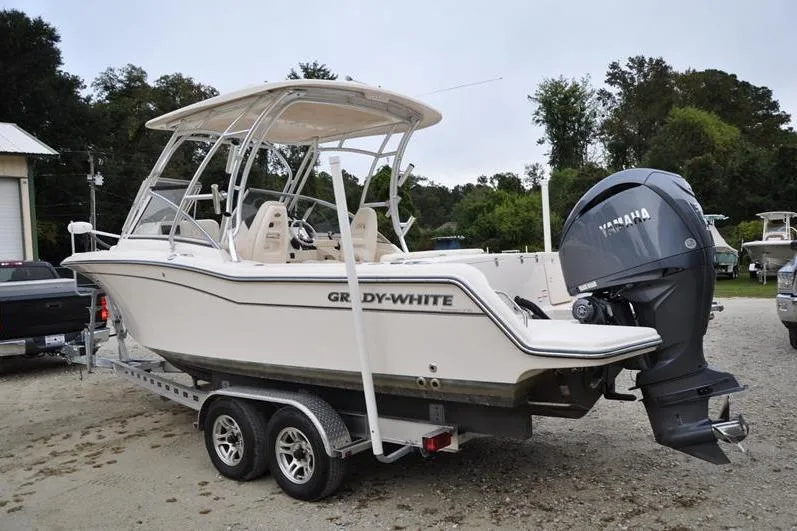 Slide: The Image of 2022 Grady-White Freedom 235 boat on trailer with Yamaha outboard motor. - 3