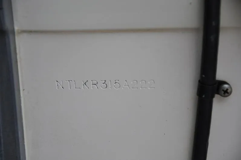 Slide: The Image of Hull identification number on 2022 Grady-White Freedom 235 boat. - 36