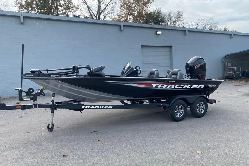 Slide: The Image of 2026 Tracker Pro Team 195 boat on trailer, parked outdoors. - 5