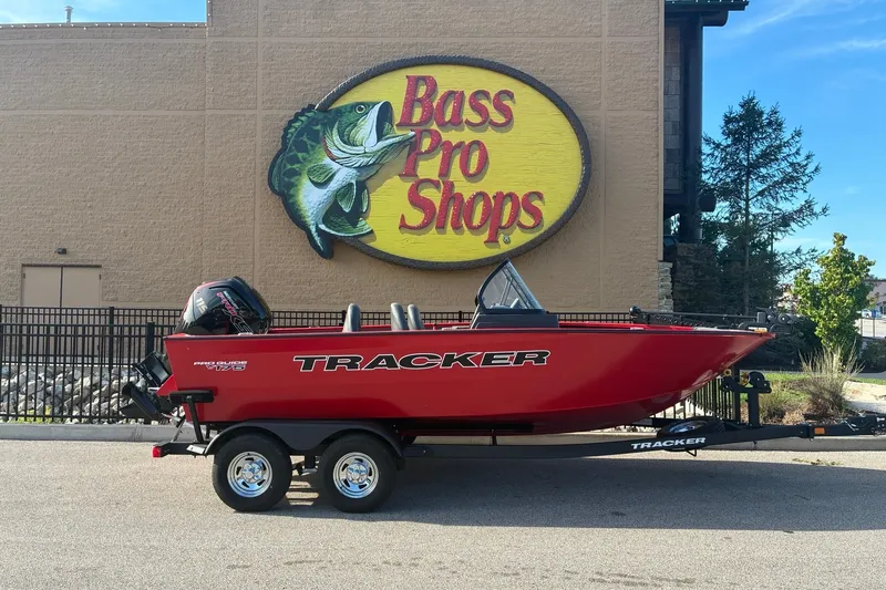 The Image of 2026 Tracker Pro Guide V-175 WT boat displayed outside Bass Pro Shops. - 0