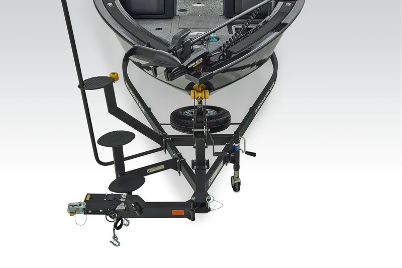 Slide: The Image of 2026 Tracker Targa V-19 WT boat interior with seating and Mercury Pro engine. - 11