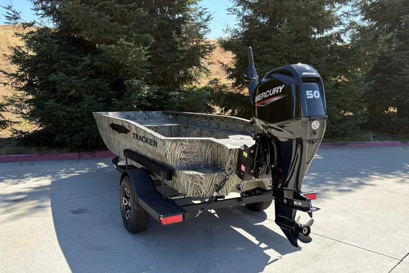 Slide: The Image of 2026 Tracker Grizzly 1650 T Prairie Wings Edition boat with Mercury 50 engine. - 11