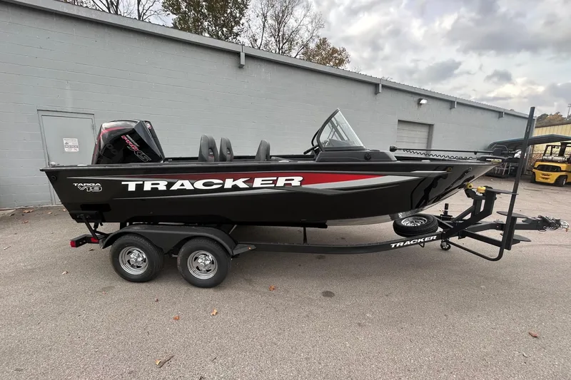 The Image of 2026 Tracker Targa V-19 Combo boat on trailer, parked outdoors. - 0