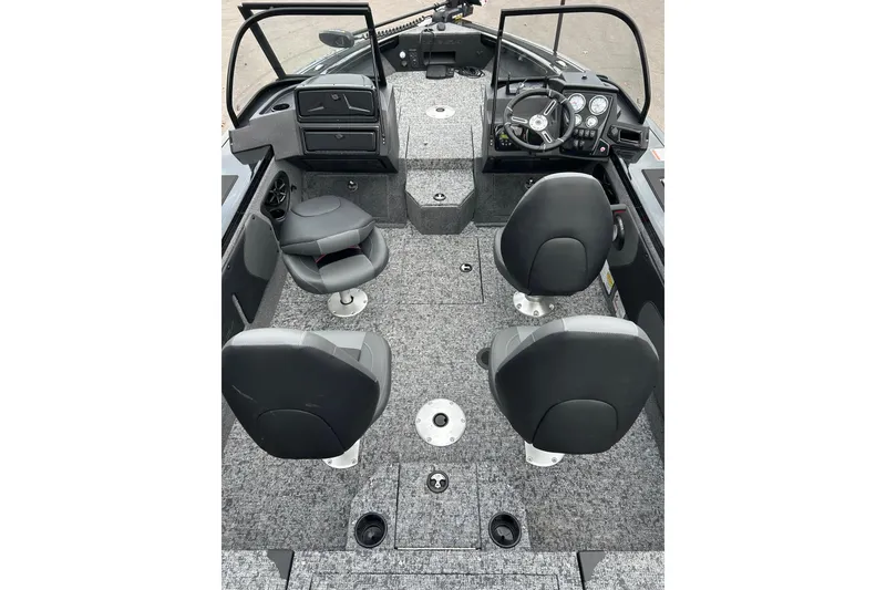 Slide: The Image of 2026 Tracker Targa V-19 Combo boat on trailer, side view, beige color. - 2