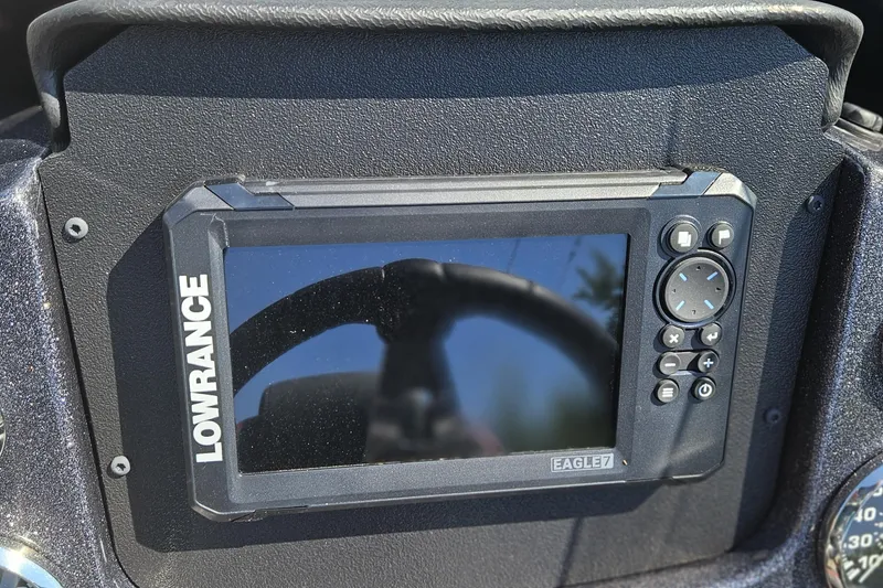 Slide: The Image of Lowrance Eagle 7 fishfinder on 2026 Tahoe T21 dashboard. - 92