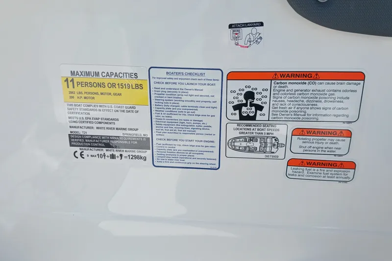 Slide: The Image of Safety and capacity labels on a 2026 Tahoe T21 boat, detailing maximum load and warnings. - 10