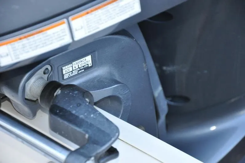 Slide: The Image of Close-up of a Yamaha engine component on a 2015 Grady-White Marlin 300 boat. - 31