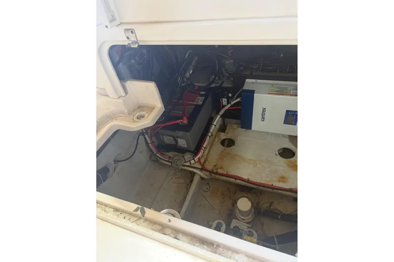 Slide: The Image of Close-up of a Yamaha engine component on a 2015 Grady-White Marlin 300 boat. - 35