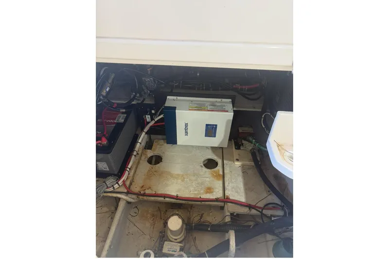 Slide: The Image of Close-up of a 2015 Grady-White Marlin 300 boat engine component. - 36