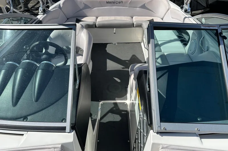 Slide: The Image of 2007 MasterCraft X-15 boat interior with steering wheel and seating area. - 8
