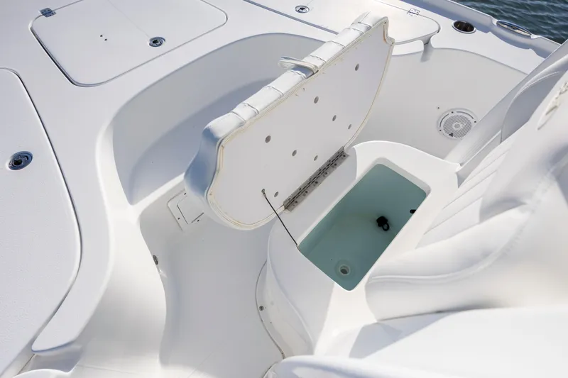 Slide: The Image of 2019 Sea Hunt BX 22 BR boat interior with open storage compartment. - 14