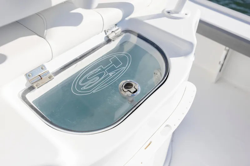 Slide: The Image of 2019 Sea Hunt BX 22 BR boat livewell with logo on glass lid. - 26