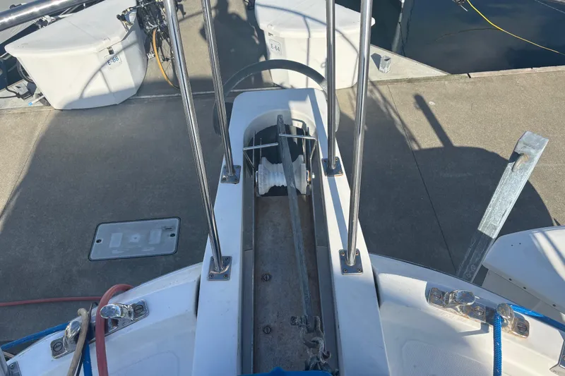 Slide: The Image of Bow of 1986 Ponderosa boat with anchor and dock equipment. - 6