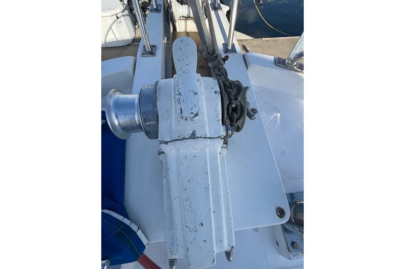 Slide: The Image of 1986 Ponderosa boat anchor windlass with chain on deck. - 7