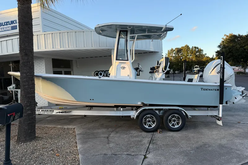 Slide: The Image of 2026 Tidewater 2300 Carolina Bay boat with Yamaha engine on a trailer. - 1