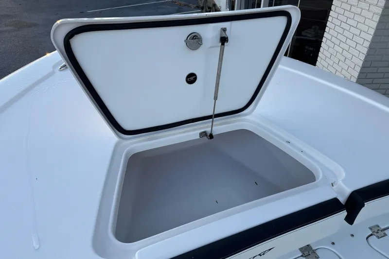Slide: The Image of 2026 Tidewater 2300 Carolina Bay boat seats with black and white upholstery. - 14