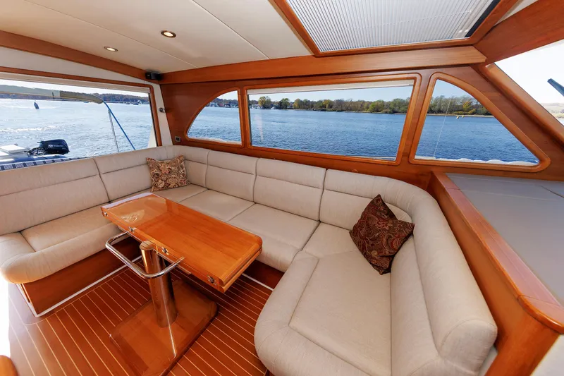Slide: The Image of Luxurious interior of 2019 Grand Banks 44 Eastbay SX yacht with scenic water view. - 2