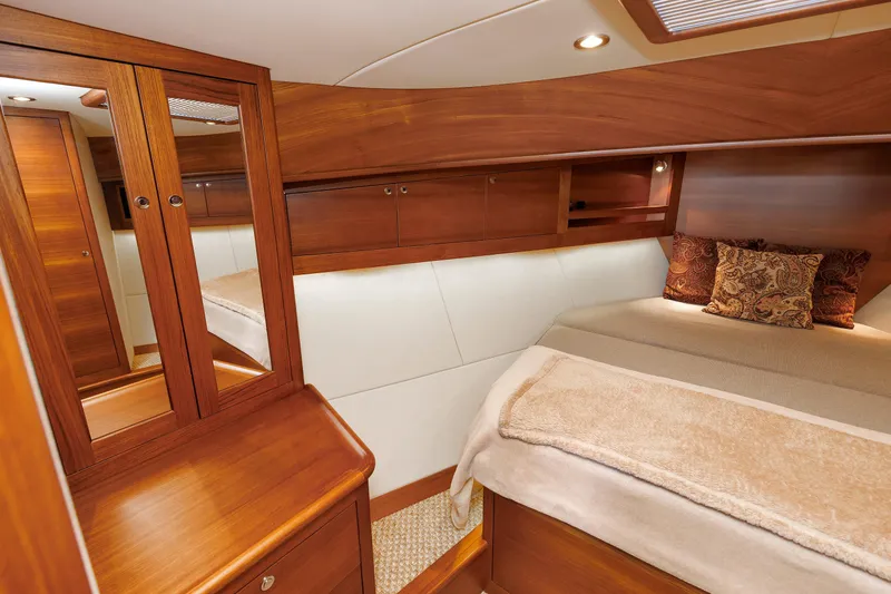 Slide: The Image of Luxurious cabin interior of 2019 Grand Banks 44 Eastbay SX yacht, featuring elegant wood finishes. - 43
