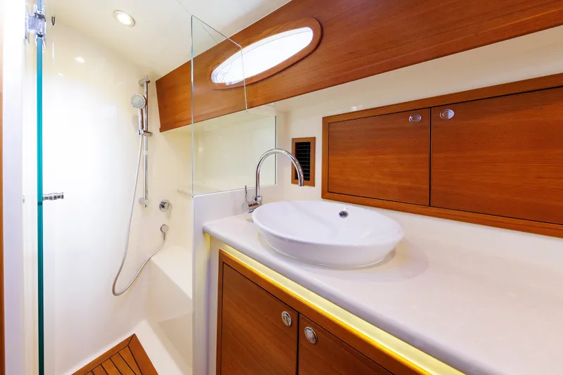 Slide: The Image of Luxurious bathroom in 2019 Grand Banks 44 Eastbay SX yacht with modern fixtures. - 47