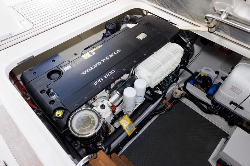 Slide: The Image of Engine compartment of 2019 Grand Banks 44 Eastbay SX with Volvo Penta IPS 600. - 55