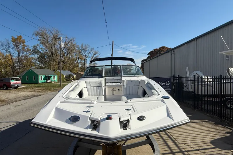 Slide: The Image of 2008 Regal 2520 FasDeck boat on display, showcasing spacious seating and sleek design. - 13