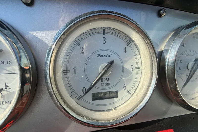Slide: The Image of Close-up of 2008 Regal 2520 FasDeck RPM gauge, showing Faria brand. - 27