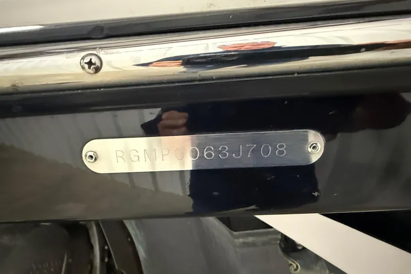 Slide: The Image of 2008 Regal 2520 FasDeck boat identification plate with serial number RGMP0063J708. - 31