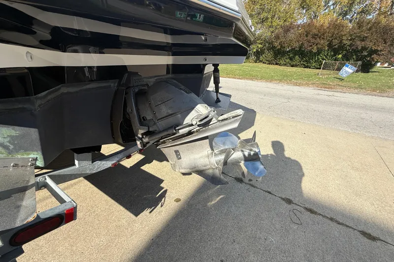 Slide: The Image of Rear view of a 2008 Regal 2520 FasDeck boat with visible propeller and outdrive. - 4