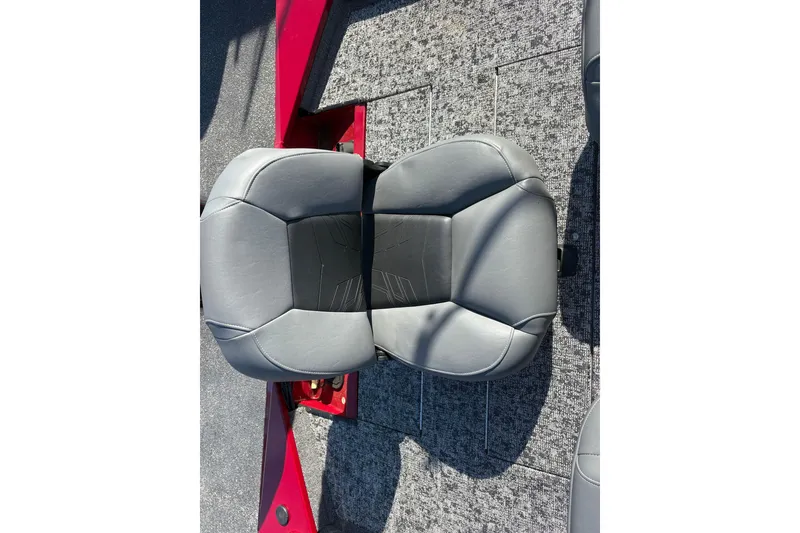 Slide: The Image of Gray seat on 2024 Bass Tracker Pro Team 170 boat with red accents. - 11