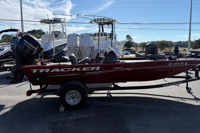 Slide: The Image of 2024 Bass Tracker Pro Team 170 boat with Mercury engine on trailer. - 3