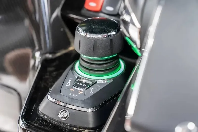 Slide: The Image of Joystick control on 2024 HCB 42 Lujo boat, featuring advanced navigation technology. - 28