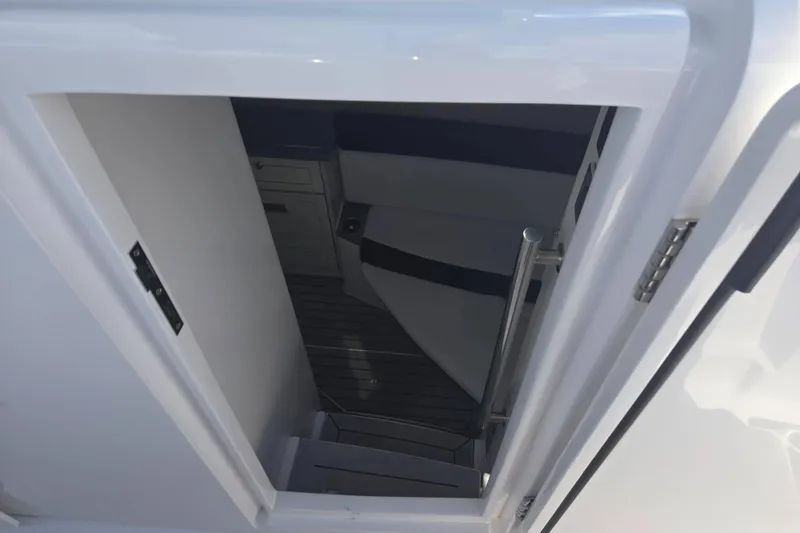 Slide: The Image of 2024 HCB 42 Lujo cabin entrance with stairs and interior view. - 34
