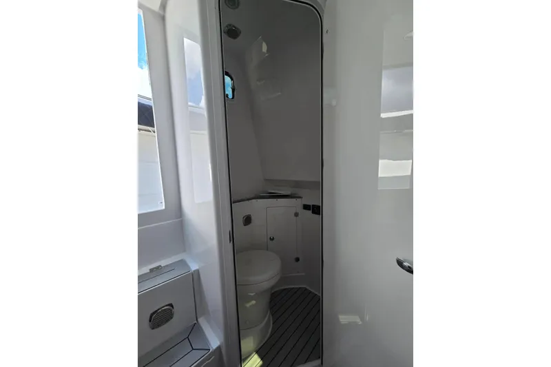 Slide: The Image of 2024 HCB 42 Lujo boat bathroom interior with modern fixtures and sleek design. - 38