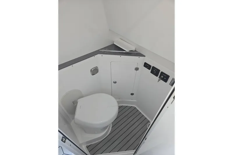 Slide: The Image of 2024 HCB 42 Lujo boat interior bathroom with modern fixtures and sleek design. - 39