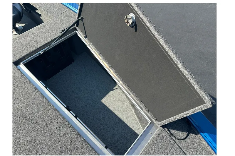 Slide: The Image of Open storage compartment on 2024 Lund 2075 Pro-V Bass XS boat. - 23