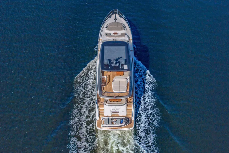 Slide: The Image of Aerial view of 2023 Princess Y72 yacht cruising on open water. - 30