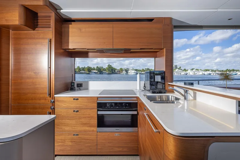 Slide: The Image of Luxurious kitchen interior on 2023 Princess Y72 yacht with modern appliances and scenic water view. - 39