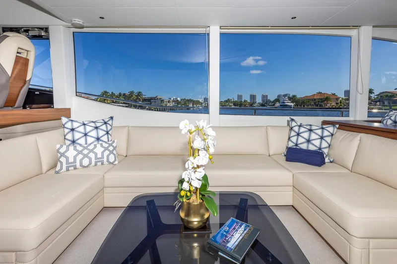 Slide: The Image of Luxurious interior of 2023 Princess Y72 yacht with elegant seating and scenic window view. - 42
