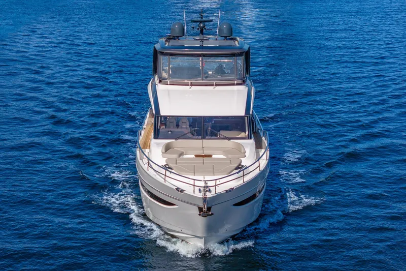 Slide: The Image of Luxurious 2023 Princess Y72 yacht cruising on open blue waters. - 5