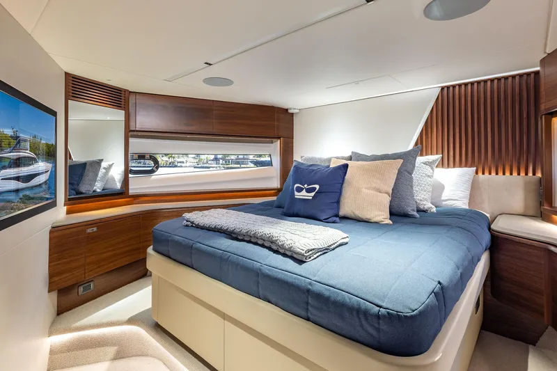 Slide: The Image of Luxurious 2023 Princess Y72 yacht bedroom with elegant decor and comfortable bedding. - 58