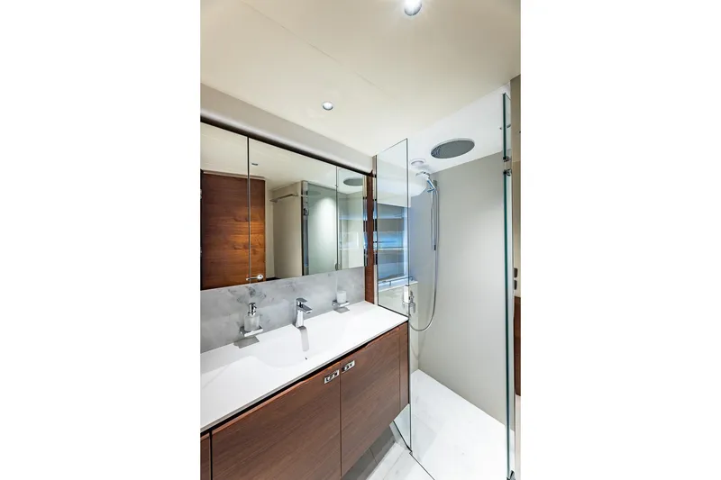 Slide: The Image of Luxurious bathroom in 2023 Princess Y72 yacht with modern fixtures and elegant design. - 59