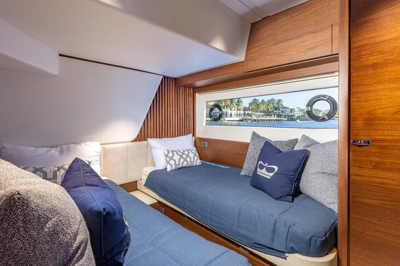 Slide: The Image of Luxurious interior of 2023 Princess Y72 yacht with elegant wood paneling and plush seating. - 66