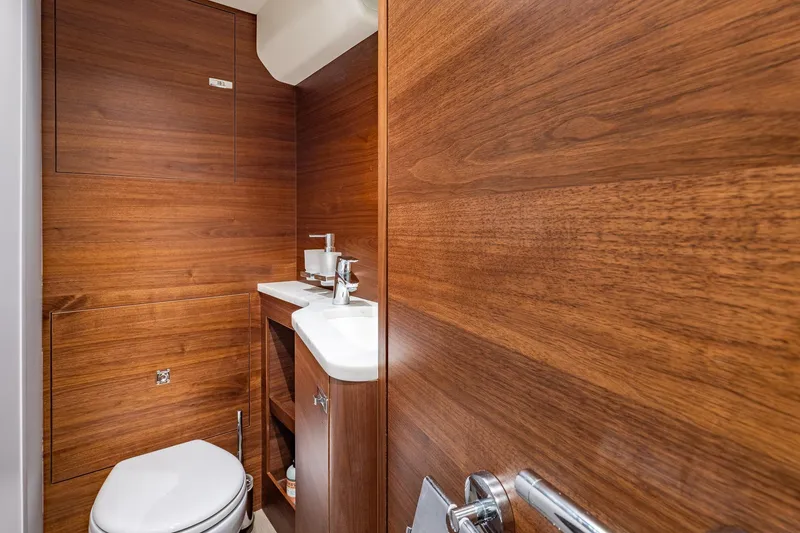 Slide: The Image of Luxurious wooden bathroom interior on 2023 Princess Y72 yacht, featuring modern fixtures. - 69
