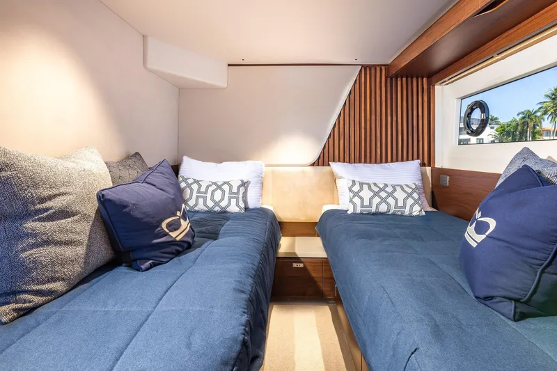 Slide: The Image of Luxurious cabin interior of 2023 Princess Y72 yacht with twin beds and elegant decor. - 70