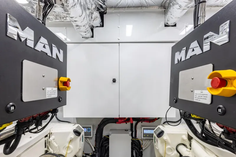 Slide: The Image of Engine room of 2023 Princess Y72 yacht featuring MAN engines and advanced equipment. - 73
