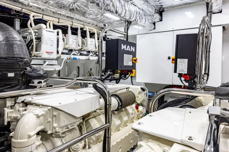 Slide: The Image of Engine room of 2023 Princess Y72 yacht, featuring MAN engines and advanced equipment. - 74
