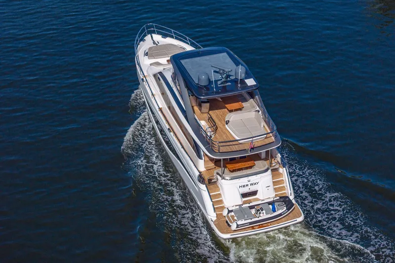 Slide: The Image of Luxurious 2023 Princess Y72 yacht cruising on open water, aerial view. - 78