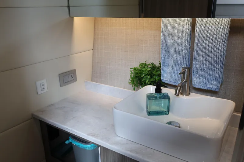 Slide: The Image of 2022 Regal 38 SAV interior with microwave and wooden cabinetry. - 79