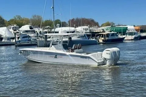 Slide: The Image of 2023 Jupiter 30 boat helm with steering wheel and controls. - 69