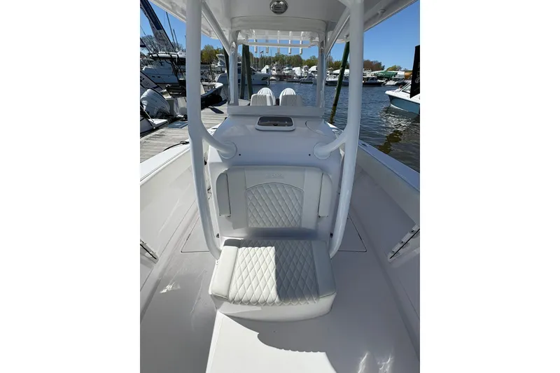 Slide: The Image of Open anchor compartment on 2023 Jupiter 30 boat at dockside. - 97